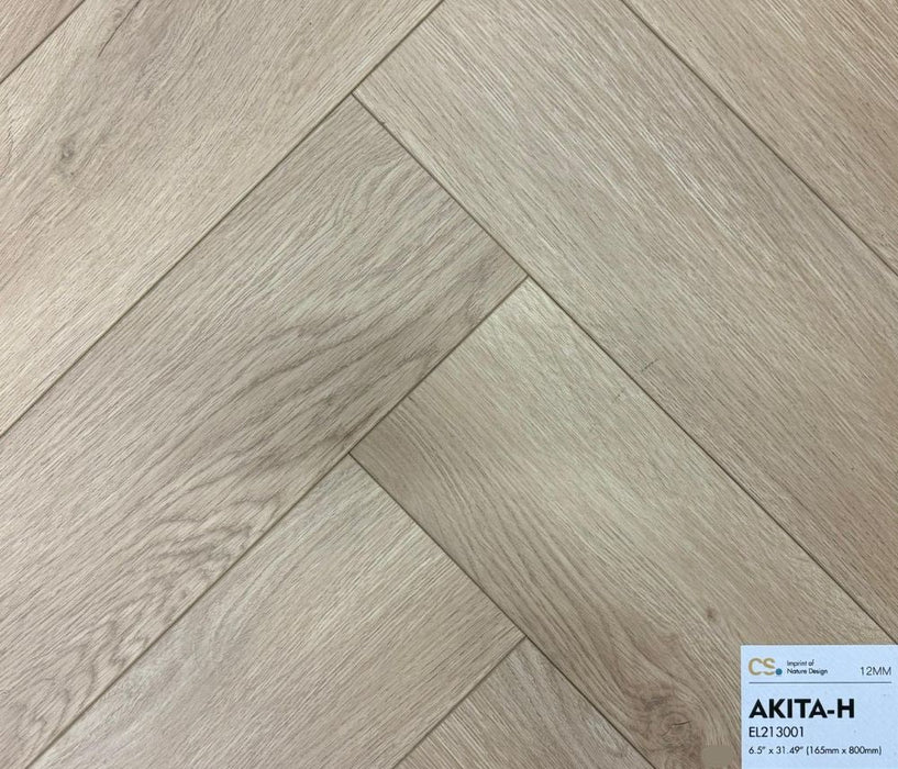 Canadian Standard Akita 12mm waterproof laminate flooring arranged in a classic herringbone pattern with realistic textured wood grain