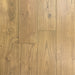Canadian Standard Brand Coverings Loretta Teak solid hardwood flooring featuring 4 3/4-inch wide planks with a wirebrushed natural wood grain texture