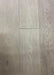 Canadian Standard Brand Surfaces Sapphire Grey Hickory HDF engineered click flooring featuring 6.5-inch wide planks and brushed wood texture