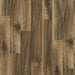 Canadian Standard EGGER PRO Gray Leoma Walnut 12mm laminate flooring featuring 7.6-inch wide planks with natural walnut-look wood grain
