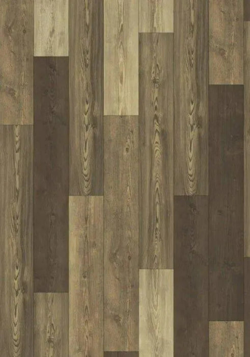 Canadian Standard EGGER PRO Gray Sorgono Pine 12mm laminate flooring featuring 7.6-inch wide planks with realistic pine-look wood grain