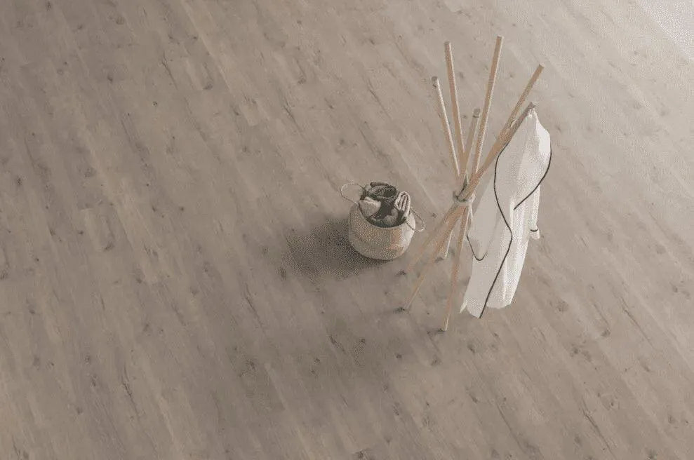 Canadian Standard EGGER PRO Murom Oak Gray 12mm laminate flooring featuring 7.6-inch wide oak-look planks with realistic wood grain detailing room scene overview