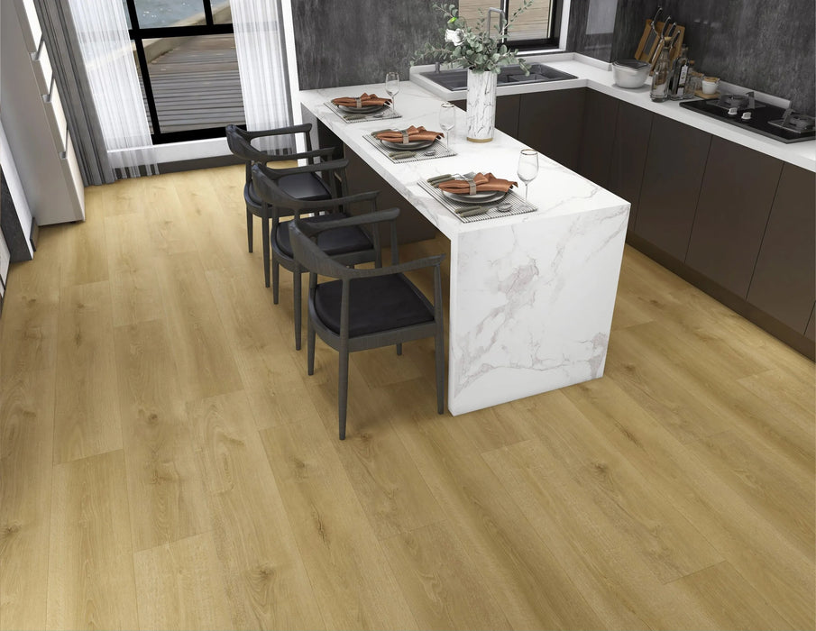 Canadian Standard Nara Elemental12 waterproof laminate flooring featuring wide 9.29-inch wood-look planks with realistic grain and textured finish in a dining room