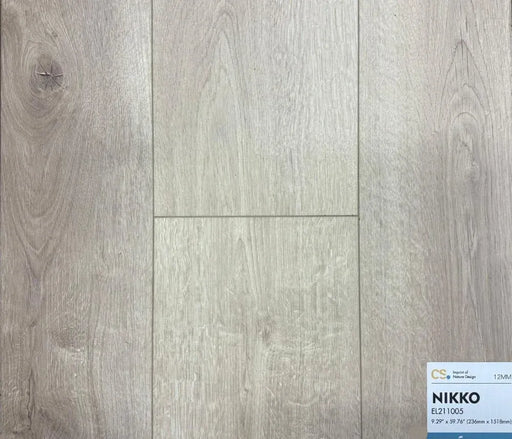 Canadian Standard Nikko Elemental12 waterproof laminate flooring featuring wide 9.29-inch wood-look planks with realistic grain and textured finish