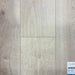 Canadian Standard Nikko Elemental12 waterproof laminate flooring featuring wide 9.29-inch wood-look planks with realistic grain and textured finish
