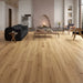 Canadian Standard Shikoku Elemental12 waterproof laminate flooring featuring wide 9.29-inch wood-look planks with realistic grain and textured finish in a living room