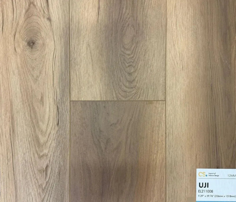 Canadian Standard Uji Elemental12 waterproof laminate flooring featuring wide 9.29-inch wood-look planks with realistic grain and textured finish
