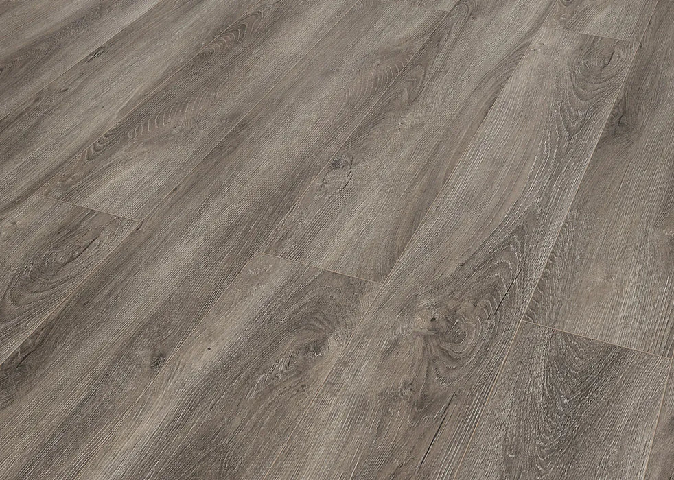 Canadian Standard Inhaus Elandura Caraway waterproof rigid core vinyl flooring featuring grey wood-look grain, medium colour variation and 6.81-inch-wide planks detail closeup