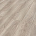 Canadian Standard Inhaus Elandura Clove 5mm waterproof rigid core vinyl flooring featuring medium taupe oak-look grain with medium tonal variation plank details closeup