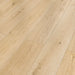 Canadian Standard Inhaus Elandura Gilmour 5mm waterproof rigid core vinyl flooring featuring light blonde wood-look grain with light tonal variation plank details closeup