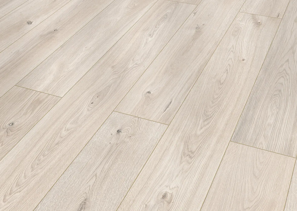 Canadian Standard Inhaus Elandura Seaside 5mm waterproof rigid core vinyl flooring featuring light white-toned wood grain with subtle tonal variation plank details closeup