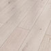 Canadian Standard Inhaus Elandura Silver Sand 5mm waterproof rigid core vinyl flooring featuring light grey oak-look grain with light tonal variation plank details closeup