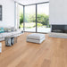 Canadian Standard Inhaus Elandura Sutter 5mm waterproof rigid core vinyl flooring featuring light blonde wood-look grain with medium tonal variation in a living room
