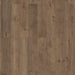 Canadian Standard Inhaus Elandura Tuscan 5mm waterproof rigid core vinyl flooring featuring dark brown wood-look grain with medium tonal variation plank layout
