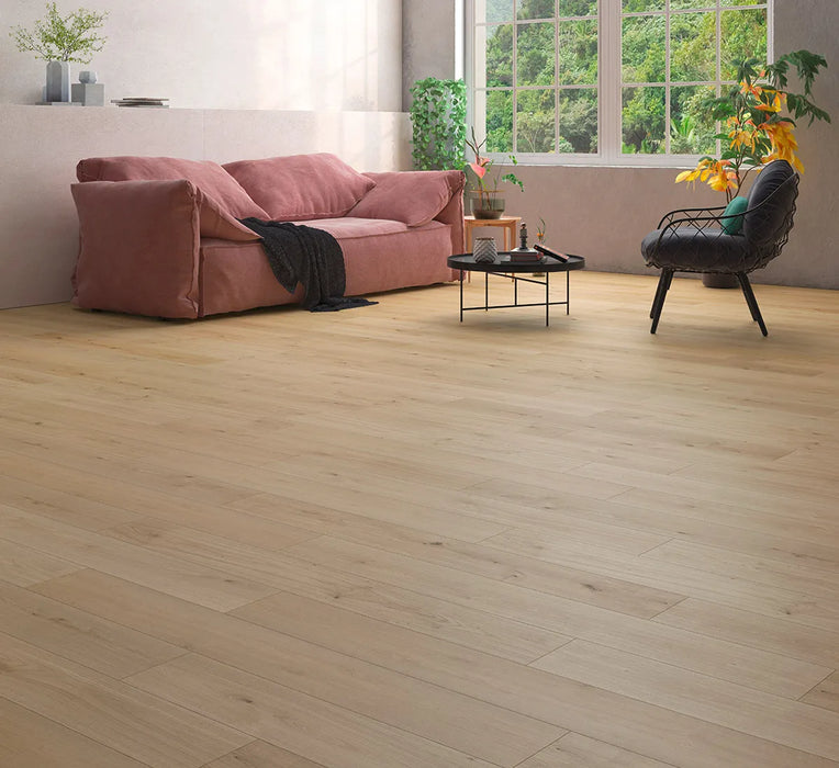 Canadian Standard Inhaus Elandura Urban 5mm waterproof rigid core vinyl flooring featuring light beige wood-look grain with subtle tonal variation in a living room