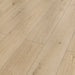 Canadian Standard Inhaus Elandura Urban 5mm waterproof rigid core vinyl flooring featuring light beige wood-look grain with subtle tonal variation plank details closeup