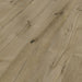 Canadian Standard Inhaus Elandura Woodwind 5mm waterproof rigid core vinyl flooring featuring medium brown wood-look grain with light tonal variation plank details closeup
