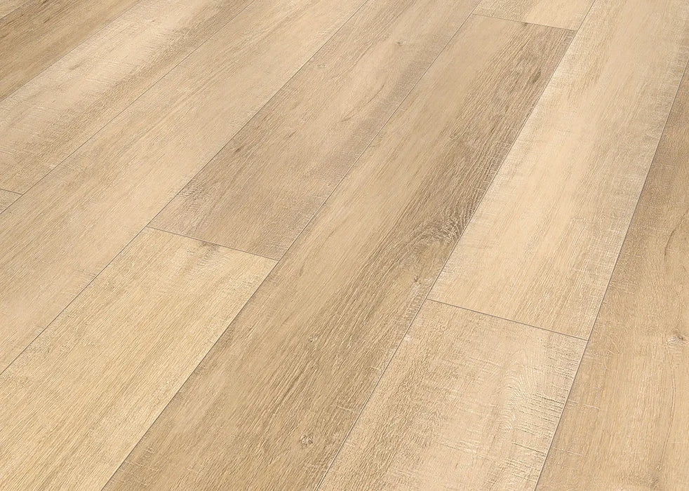 Canadian Standard Inhaus Inspiration Lamdura Edgewood 8mm laminate flooring featuring light oak-look wood grain and 7.56-inch-wide planks detail closeup