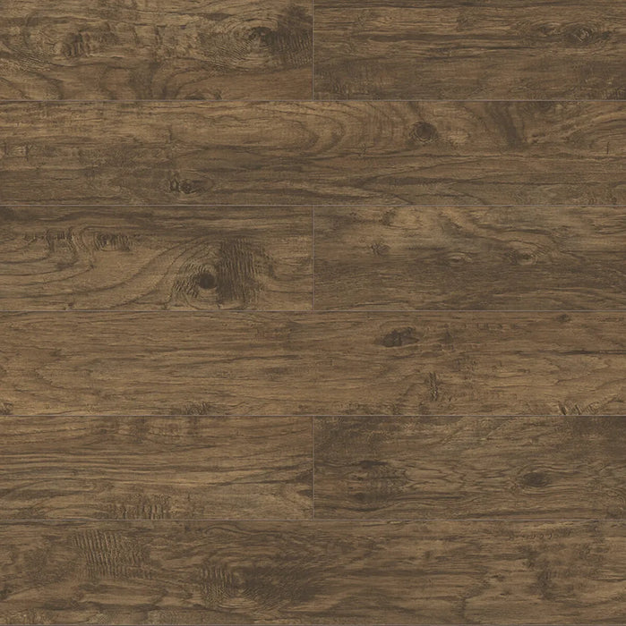 Canadian Standard Inhaus Inspiration Lamdura Grizzly 10mm water-resistant laminate flooring featuring handscraped wood-look planks and 2mm attached pad