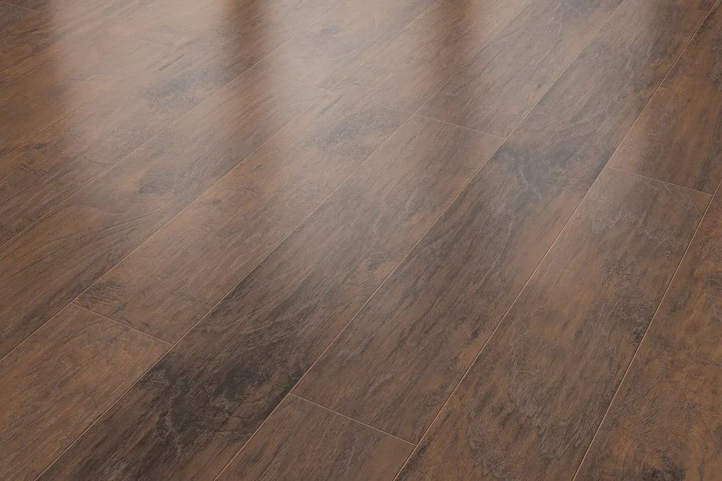 Canadian Standard Inhaus Inspiration Lamdura Tisdale 10mm water-resistant laminate flooring featuring handscraped wood-grain texture and attached pad plank details