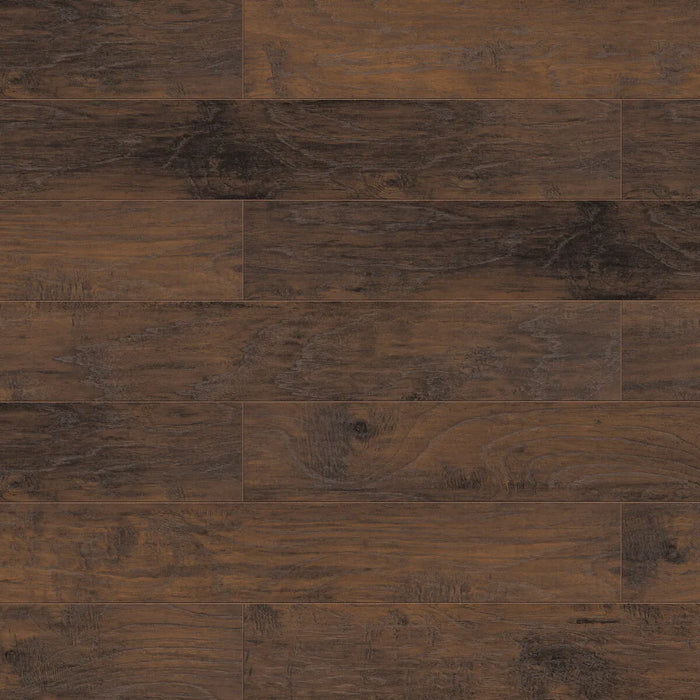 Canadian Standard Inhaus Inspiration Lamdura Tisdale 10mm water-resistant laminate flooring featuring handscraped wood-grain texture and attached pad