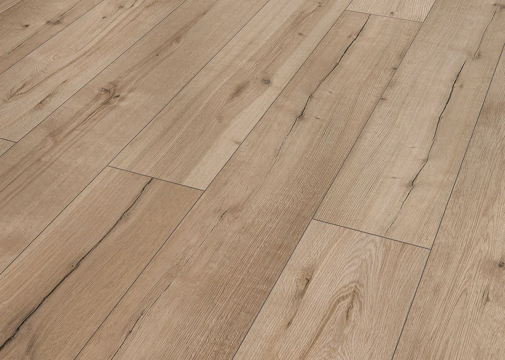 Canadian Standard Inhaus Inspiration Lamdura Woodside 8mm water-resistant laminate flooring featuring natural-looking wood grain and 7.56-inch-wide planks detail closeup