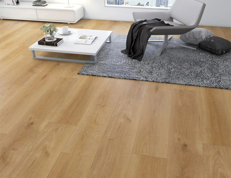 Canadian Standard Nagasaki Elemental12 waterproof laminate flooring featuring wide 9.29-inch wood-look planks with realistic grain and textured finish applied in a living room