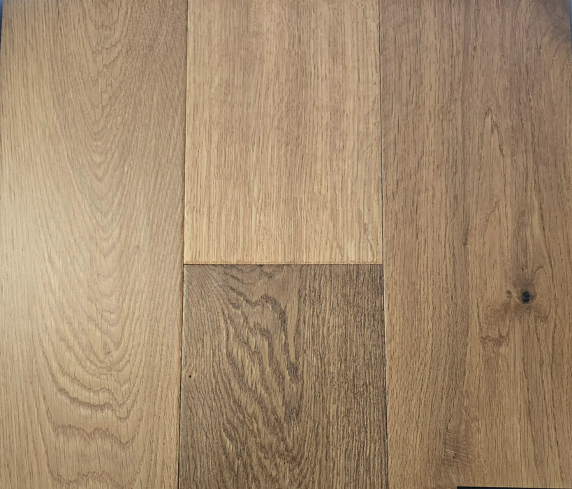 Canadian Standard Origins Quincy Oak engineered hardwood featuring 6.5-inch planks with natural grain and smoked stain detailing