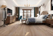 Canadian Standard Origins XL Geraldine Oak engineered hardwood flooring featuring 7.5-inch wide planks with handscraped and wirebrushed texture in a bedroom