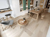 Canadian Standard Origins XL Thatcher American Hickory engineered hardwood flooring featuring 7.5-inch wide planks with natural wood grain and wirebrushed texture in a dining room