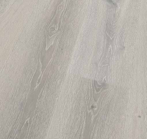 Canadian Standard Ridgecrest Lake View 8mm waterproof laminate flooring with 7.72-inch-wide planks, matte finish and natural wood-inspired grain plank detail closeup