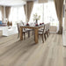 Canadian Standard Ridgecrest Lake View 8mm waterproof laminate flooring with 7.72-inch-wide planks, matte finish and natural wood-inspired grain in a dining room