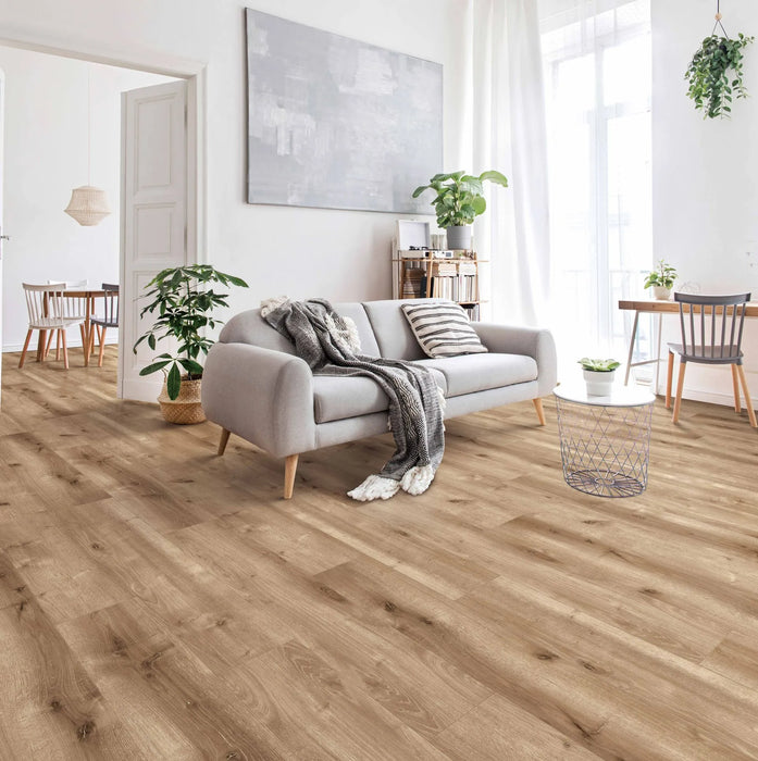 Canadian Standard Ridgecrest Laurel Ridge 8mm waterproof laminate flooring with 7.72-inch-wide planks, matte finish and distinctive wood-look grain in a living room