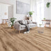 Canadian Standard Ridgecrest Laurel Ridge 8mm waterproof laminate flooring with 7.72-inch-wide planks, matte finish and distinctive wood-look grain in a living room