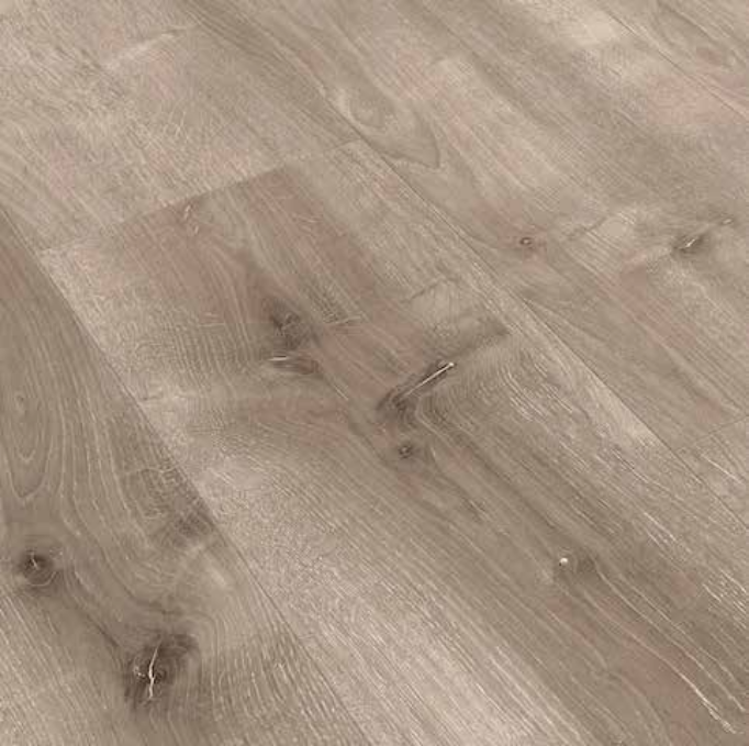 Canadian Standard Ridgecrest Laurel Ridge 8mm waterproof laminate flooring with 7.72-inch-wide planks, matte finish and distinctive wood-look grain plank detail closeup
