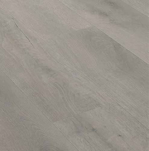 Canadian Standard Ridgecrest Willow Creek 8mm waterproof laminate flooring with 7.72-inch-wide planks, matte finish and natural-looking wood grain plank detail closeup