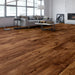 Canadian Standard SONO Eclipse Heartlan Walnut flooring featuring 8-inch wide planks with realistic walnut-inspired wood grain in a living room