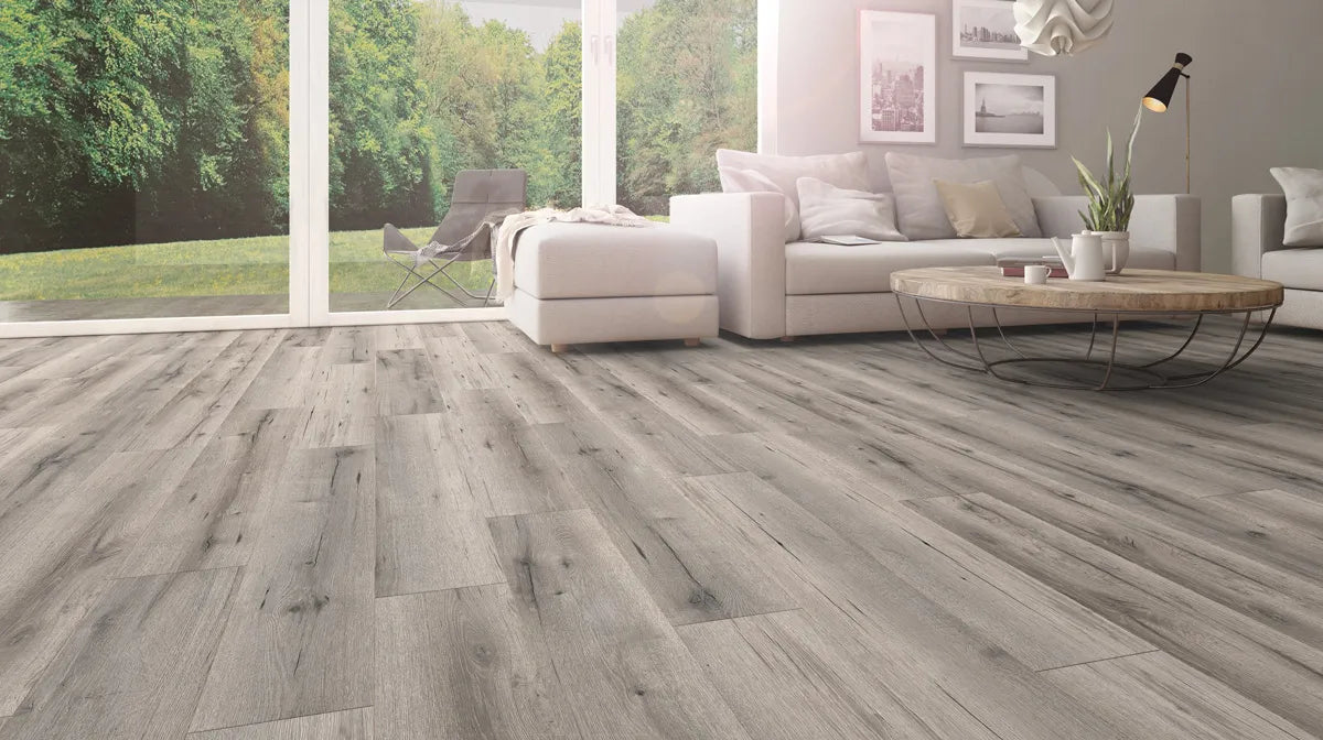 Canadian Standard SONO Eclipse Jasper Oak flooring featuring 8-inch wide planks with natural oak-look wood grain detailing in a living room