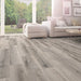 Canadian Standard SONO Eclipse Jasper Oak flooring featuring 8-inch wide planks with natural oak-look wood grain detailing in a living room