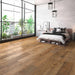 Canadian Standard SONO Eclipse Riverview Oak flooring featuring 8-inch wide planks with oak-inspired wood grain in a bedroom