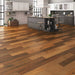 Canadian Standard SONO Eclipse Tobacco Oak flooring featuring 8-inch wide planks with realistic oak-inspired grain in a dining room