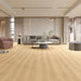 Canadian Standard Eddi Vanntett Plus 7mm waterproof SPC luxury vinyl plank flooring featuring wide wood-look planks with realistic textured grain and a matte finish in a living room