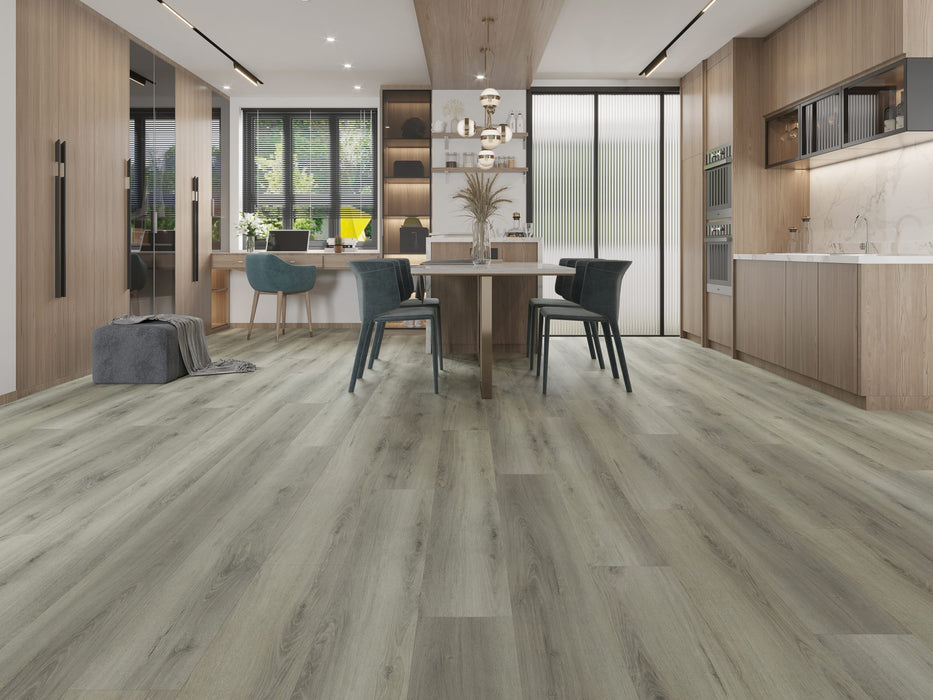 Canadian Standard Nadine Vanntett Plus 7mm waterproof SPC luxury vinyl plank flooring featuring wide wood-look planks with realistic textured grain and a matte finish in a dining room