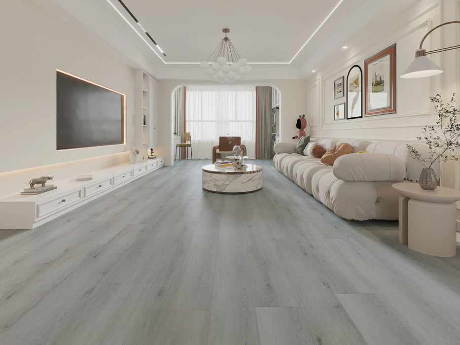 Canadian Standard Ross Vanntett Plus 7mm waterproof SPC luxury vinyl plank flooring featuring wide wood-look planks with realistic textured grain and a matte finish in a living room