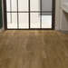 NAF AquaPlus Classic Bora Bora 7mm waterproof rigid core vinyl plank flooring with textured finish and click-lock installation applied in a room
