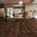 NAF AquaPlus Classic Madagascar 7mm waterproof rigid core vinyl plank flooring with textured finish and click-lock installation applied in a dining room