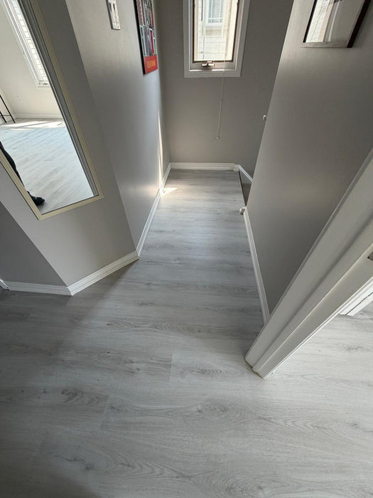 NAF AquaPlus Classic Punta Cana 7mm waterproof rigid core vinyl plank flooring with textured finish and click-lock installation applied at home