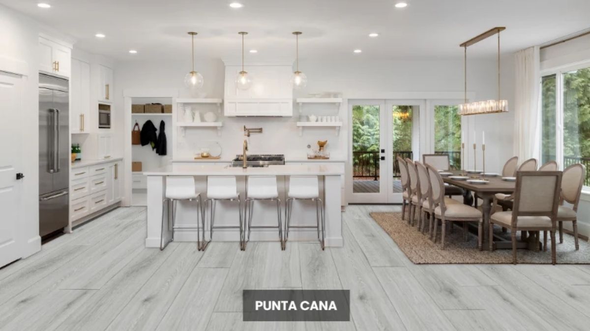 NAF AquaPlus Classic Punta Cana 7mm waterproof rigid core vinyl plank flooring with textured finish and click-lock installation applied in a living room