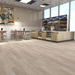 NAF AquaPlus Gold Summerhill 7mm waterproof rigid core vinyl plank flooring with realistic wood grain and deep-textured finish room scene