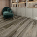 NAF AquaPlus Platinum Libra 9mm waterproof rigid core vinyl plank flooring with realistic wood grain and deep-textured finish in a living room